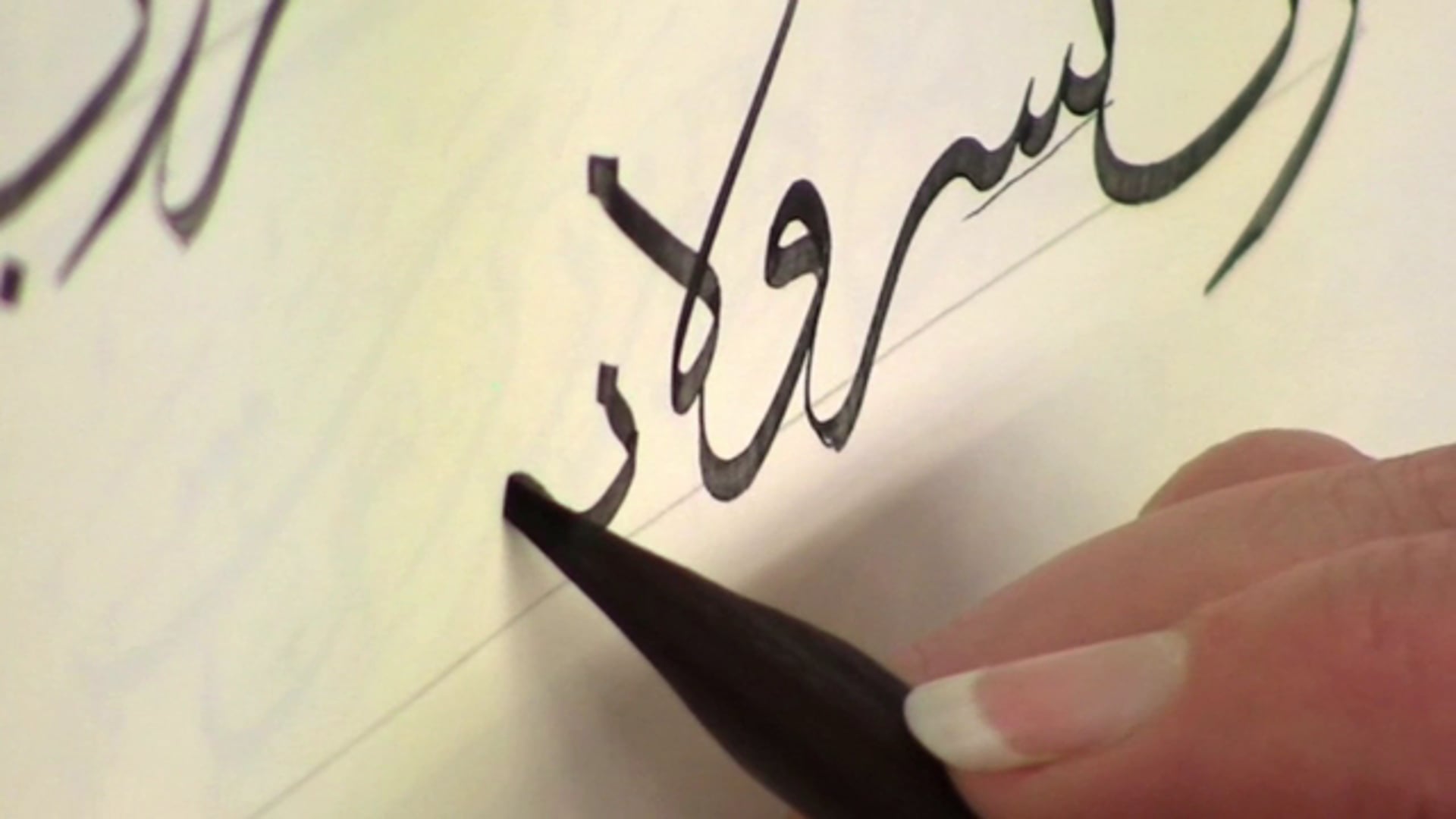 Demonstration of Arabic script calligraphy