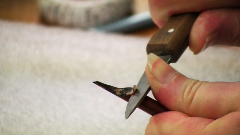 Carving the reed pen